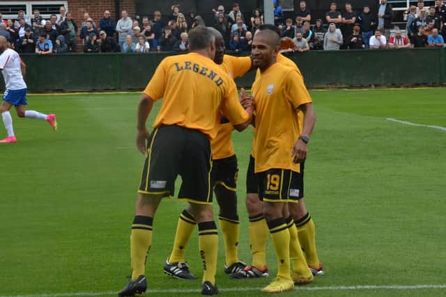 Simeon Jackson takes the congratulations after he scored for the RDFC Legends