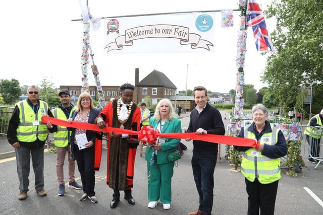 Tom Pursglove was among dignitaries to cut the ribbon at the LLoyds Road entrance to the village