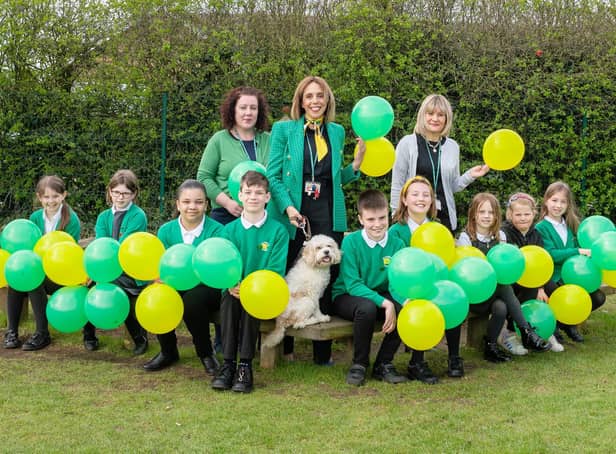 Angela Holyhead Josie Garnham and Mia Lewis with the school council and Jeff the reading dog