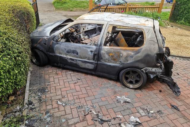 The burnt out car in Stamford Road, Kettering