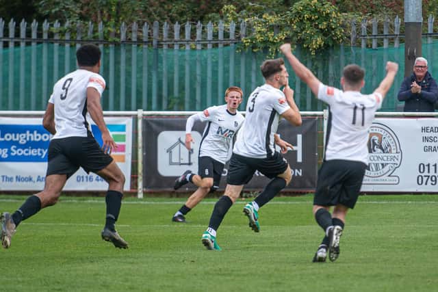 Jack Keeble runs away to celebrate after heading home Corby's equaliser at Anstey (Picture: Jim Darrah)