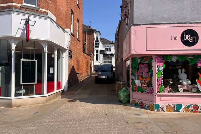 Kettering High Street at its junction with Crispin Place/National World