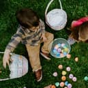 Children playing with Easter eggs.