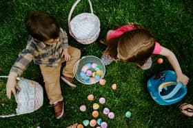 Children playing with Easter eggs.