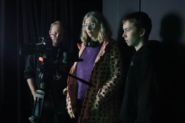 Representatives Eleanor Sier, of Delapre Abbey, reviews the footage.