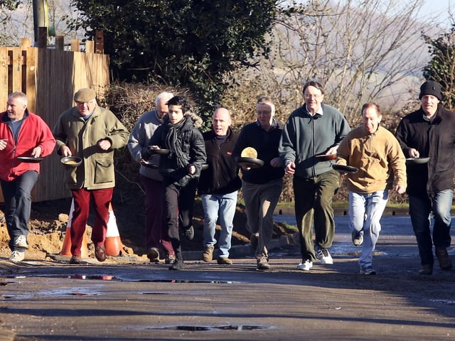 Caldecott the annual WI pancake race celebrating Shrove Tuesday - The men's race lead from start to finish by Jake Hill February 2015
