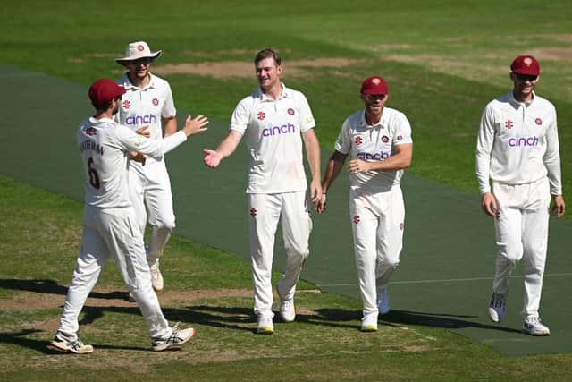 Northants bowler Tom Taylor is congratulated after taking the wicket of Lancashire's Phil Salt (Picture: Shaun Botterill/Getty Images)