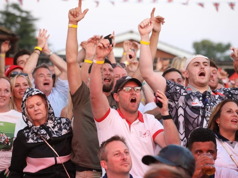 Fans at the Kettering Town FC World Cup Fan Zone watch England vs Argentina in the semi-final