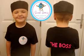 Isaac in his 'The Boss' t-shirt