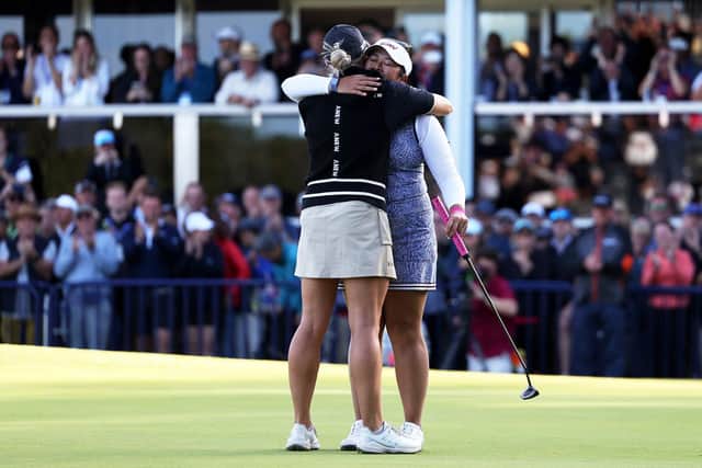 Charley Hull congratulates champion Lilia Vu after the final round