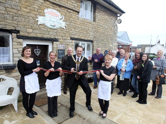 The opening of Tea Jenny Cottage in 2013. Danielle Hadden, Lorraine Hadden, Deputy Mayor Anthony Dady and Sandie McHutchison with guests