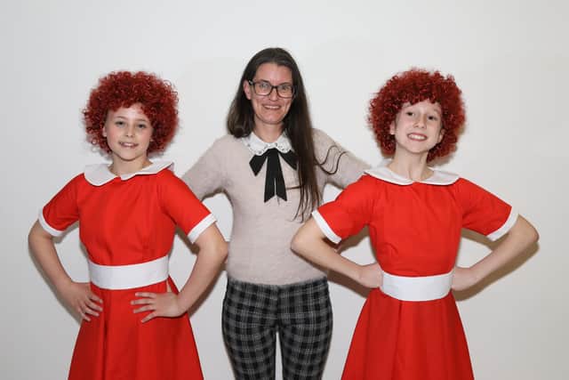 Jo Pennell and SydneyBeau Pettigrew and Elsie-Mae Mander stars of Annie in 1995 and 2025 cast from Castle Theatre Wellingborough /National World