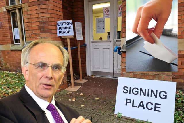 Peter Bone MP and the signing station at the Castle Theatre in Wellingborough