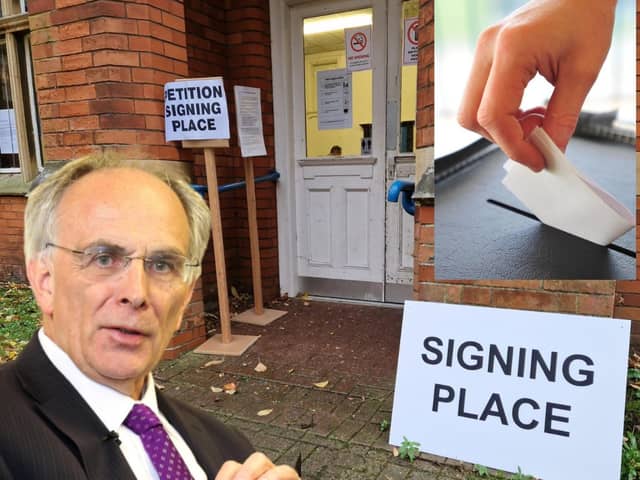 Peter Bone MP and the signing station at the Castle Theatre in Wellingborough