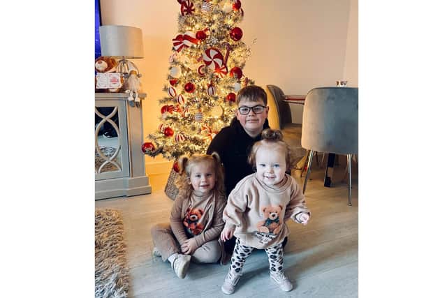 Bailey Wilson with his sisters Hallie, 3, and 1-year-old Minnie/family picture