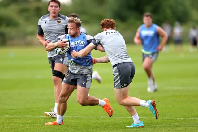 Tom Cruse on the charge in pre-season training (photo by David Rogers/Getty Images)