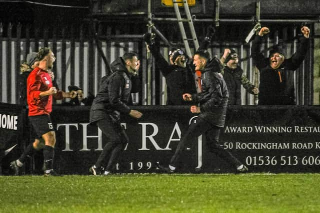 Corby boss Lee Attenborough celebrates the late winner
