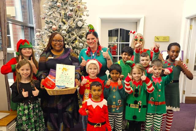 General Manager Marvellous, receiving a beautiful hamper of goodies from the little elves.