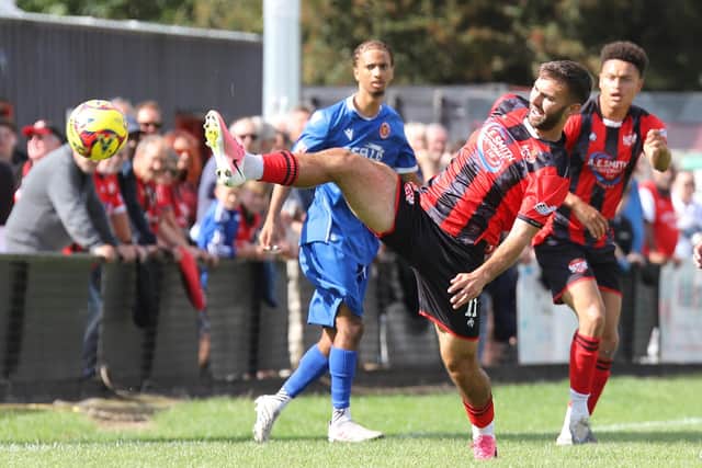 Kettering's Theo Alexandrou wins the ball (Picture: Peter Short)