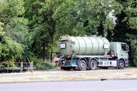 A tanker has been stationed in Rockingham Road, Corby to suck up contaminated water from the surface water drain/ IMG