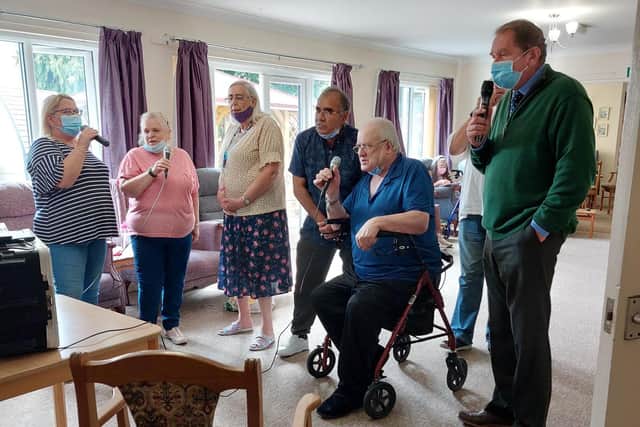 Philip Hollobone MP on the far right of the photo takes part in the karaoke