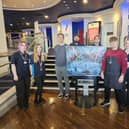 James Acaster with staff from The Odeon cinema in Kettering/National World