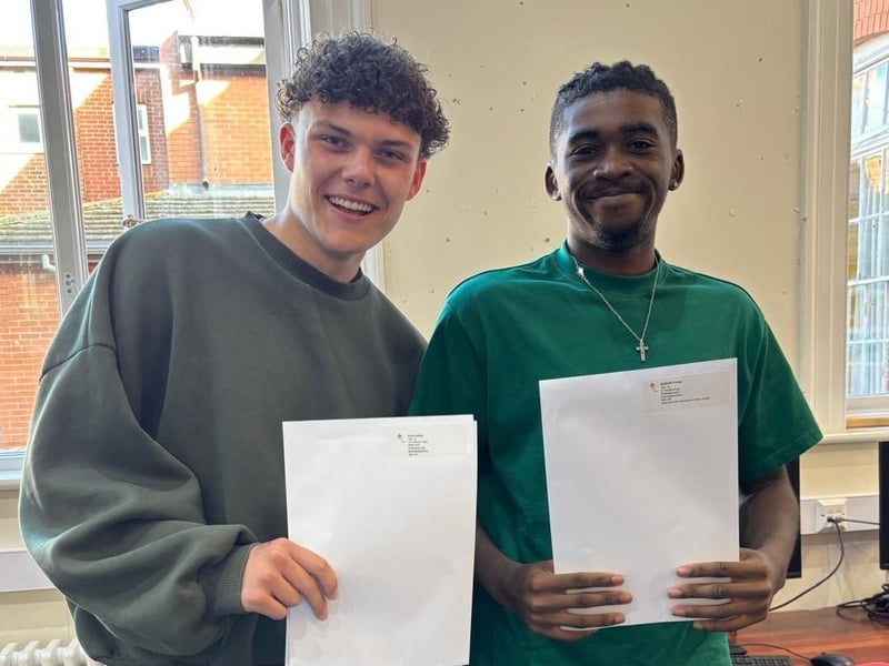 Cruz Curtis and Antonio Pusey with the exam results at Wrenn in Wellingborough