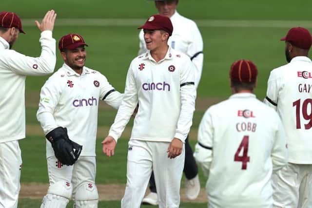 James Sales (centre) has signed a contract extension that will keep him a Northamptonshire player until the end of the 2025 season