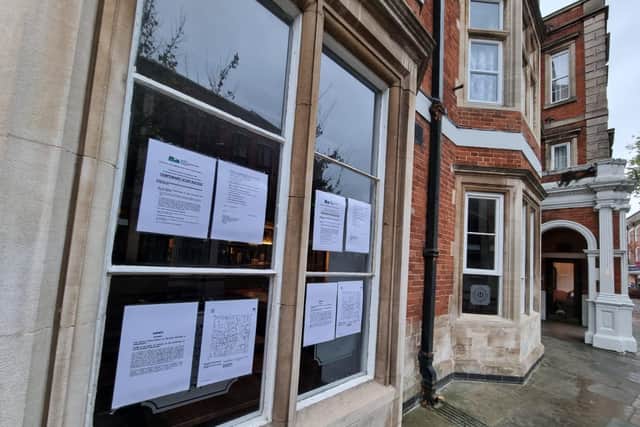 The stop notice in the window of the Royal Hotel