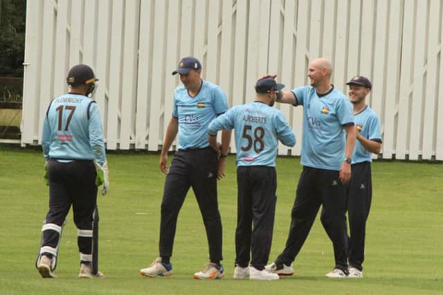 Loddington & Mawsley celebrate a wicket during their NCL T20 Cup semi-final win over Burton Latimer. Pictures by Finbarr Carroll