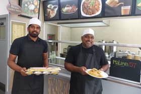 Anbarasu and Suresh with some of their dishes.