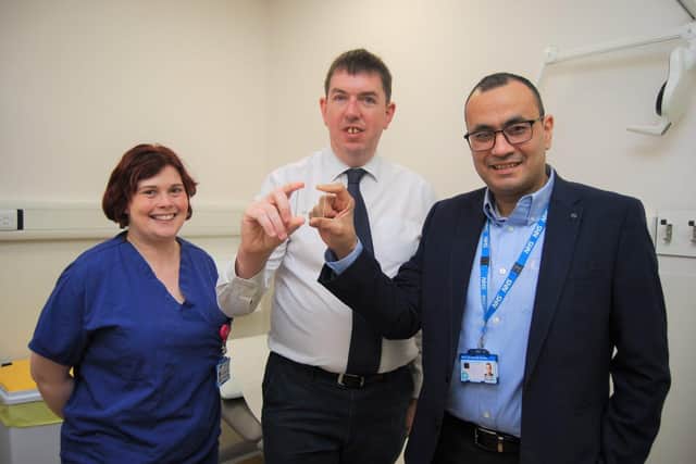 Deputy Sister Nakita Dumble-Hooper, patient Chris Stopford, and Consultant Urologist Mr Shady Nafie.