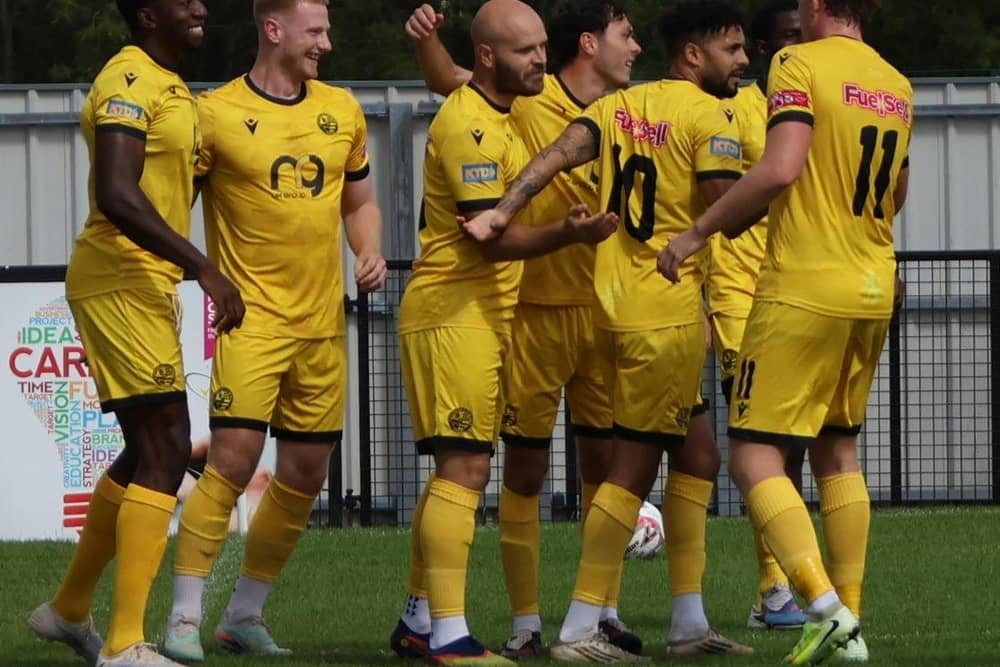 James Clifton is congratulated after firing AFC Rushden & Diamonds into a 1-0 lead at Corby (Picture: Shaun Frankham)