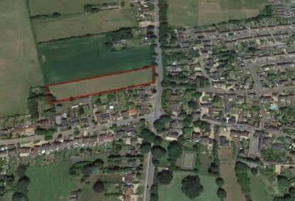 The outline in red shows where the homes would have been built