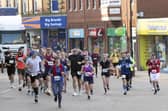 Kettering half marathon and 5k runners in High Street / Glyn Dobbs