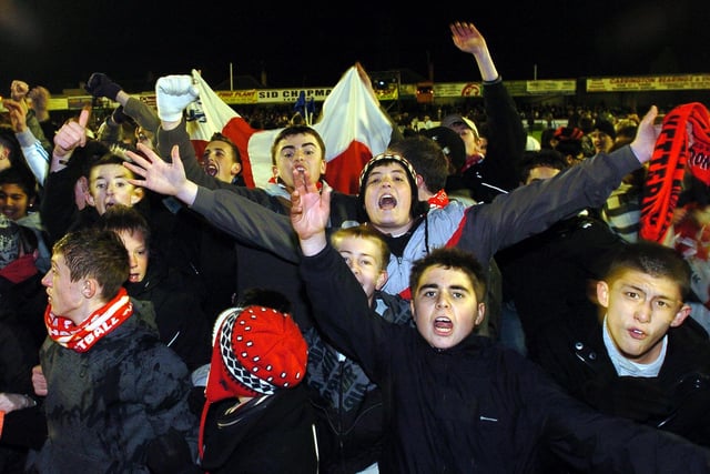 Kettering Poppies fans celebrate:  2-1 victory. December 2008