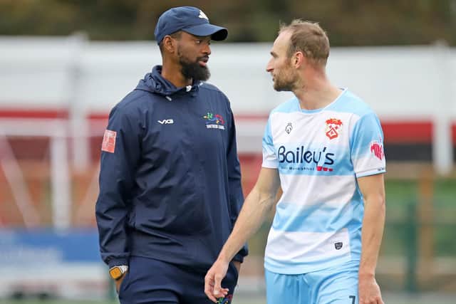 Stand-in boss Elijah Bada chats with Wes York (Picture: Peter Short)
