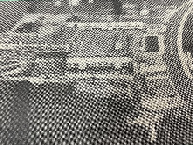 Corby town centre in the very early 50s, with Corporation Street running horizontally, The Saxon Crown at the bottom right and the land on which Willow Place now stands, undeveloped.