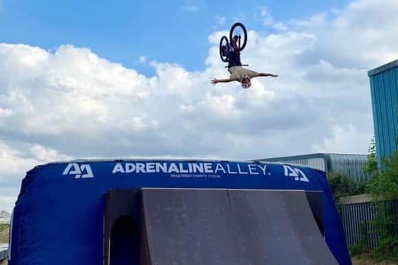 Finlay Davies doing a backflip no-hander on the new giant airbag landing at Adrenaline Alley