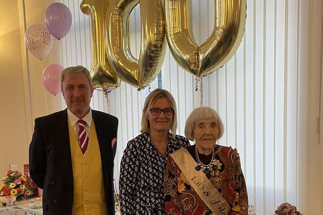 Joan Holmes with her granddaughter Sally and grandson-in-law Marcus /family picture