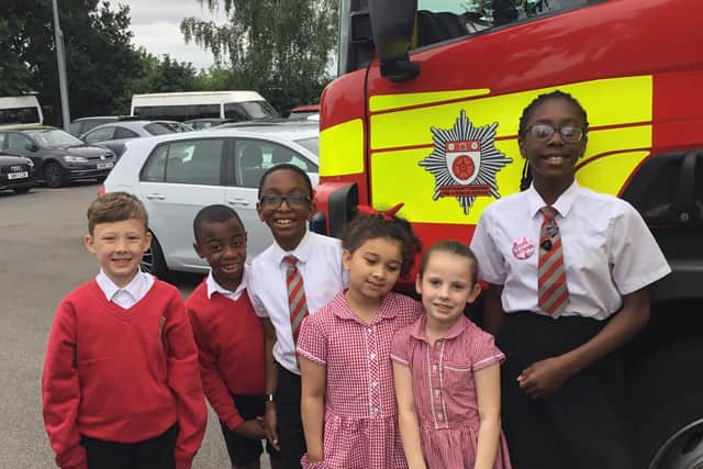 Northants Fire and Rescue brought a fire engine for the children to explore