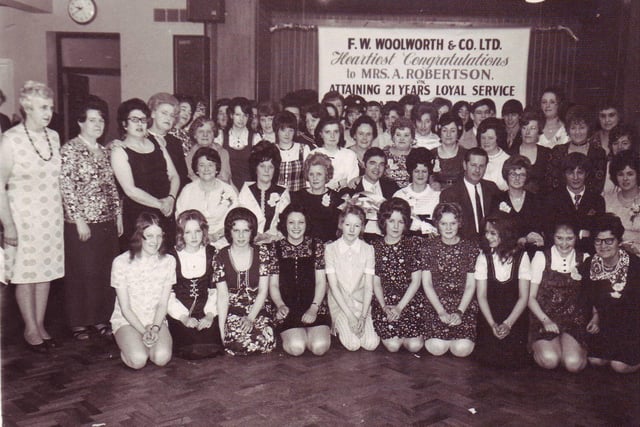 Workers at Corby's Woolworths celebrating Mrs A Robertson's 21 years of service. Undated