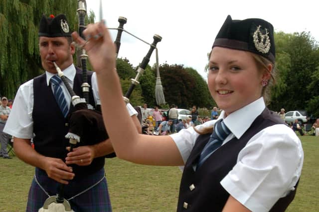 Corby Highland Gathering 2009: Shannon and father Rob Muir show off the skills as part of The Grampian club pipe band