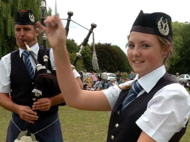 Corby Highland Gathering 2009: Shannon and father Rob Muir show off the skills as part of The Grampian club pipe band