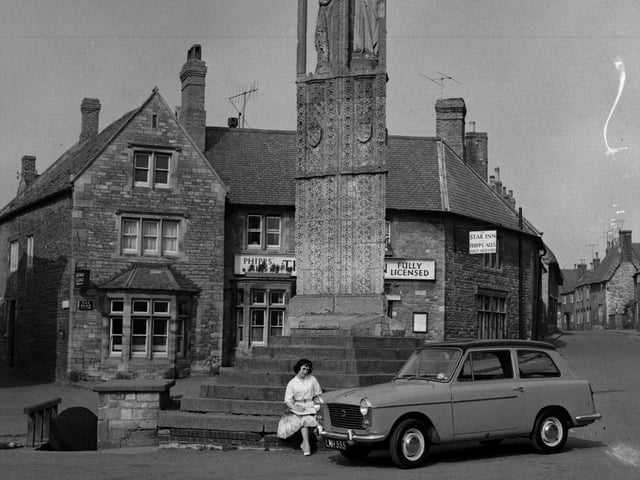 An ad feature picture for S & W Motors, Northampton, taken at the Queen Eleanor Cross, Geddington, March 25, 1960