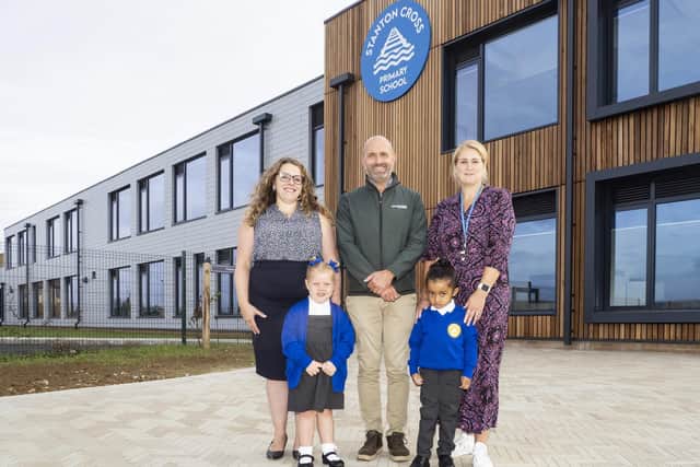 Deputy Head Sarah Whitlock, Jamie Street (Project Manager), Kim Nelson (Nursery teacher) with pupils Emaya and Oakley