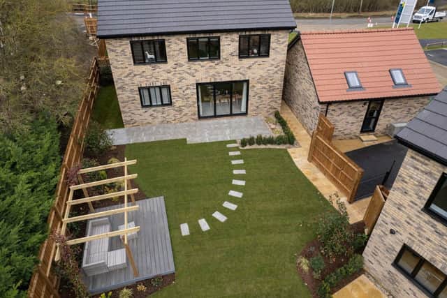 An aerial view of the show home at Cotterstock Meadows – a five-bedroom detached house in the Bovis Homes Birch style