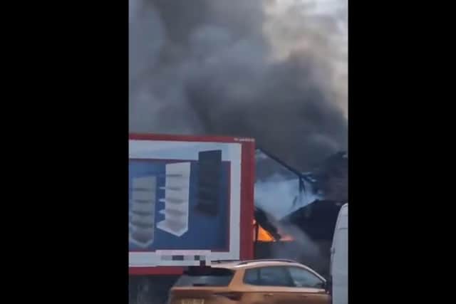 The fire just off the A45 is causing delays for drivers in the area