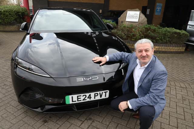 Proud  - Franco Santoro, started his career sweeping garage forecourts. He will be selling Chinese-made BYD cars at his garage in Kettering/National World