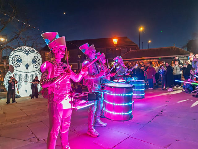 Spark! drummers kept the rhythm going into the evening, bringing sound and energy to the town centre after sunset